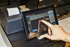 Employee using a security integrated point of sale system